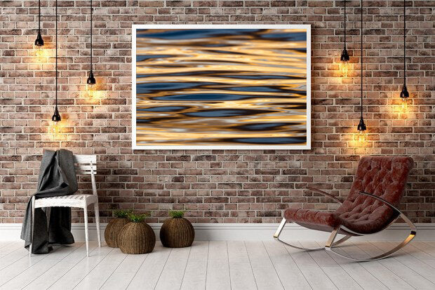 Lower the Main- A photograph by Mark McInnis hung on a brick wall.