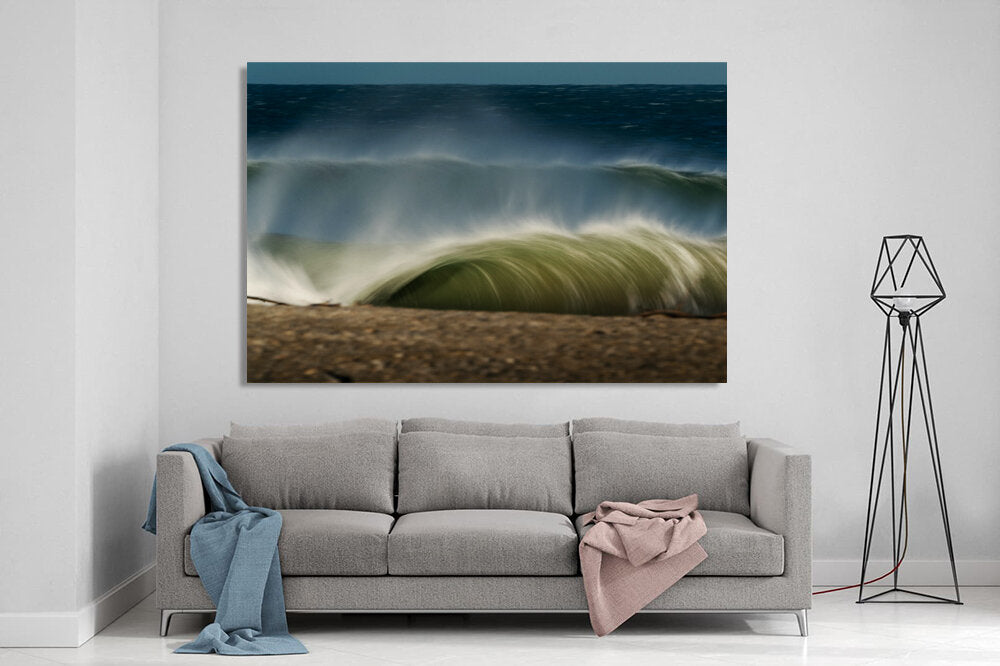 Slowly, but Surely.- A photograph by Mark McInnis above a Grey couch.