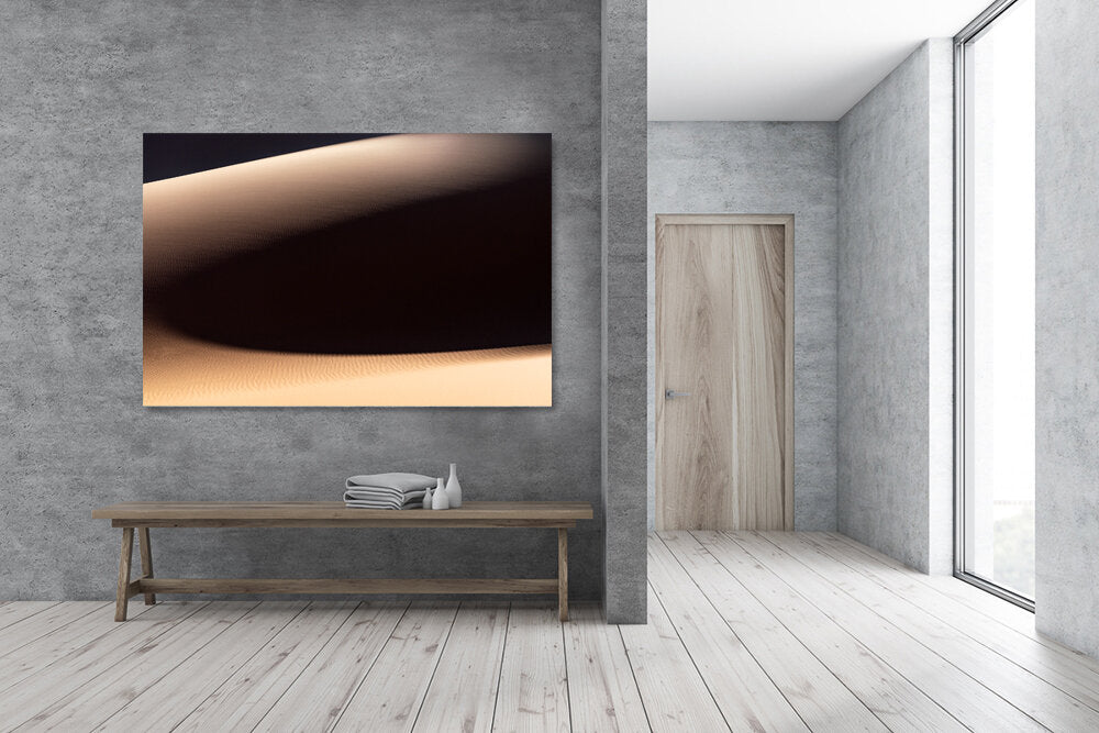 Sahara Sands- A photograph by Mark McInnis above a bench.