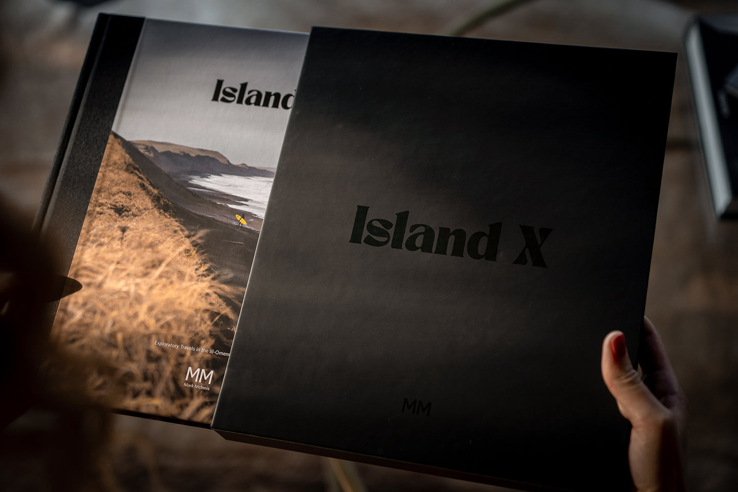 Island X- A photography book by Mark McInnis- Limited edition front cover with fabric spine and black slip case.