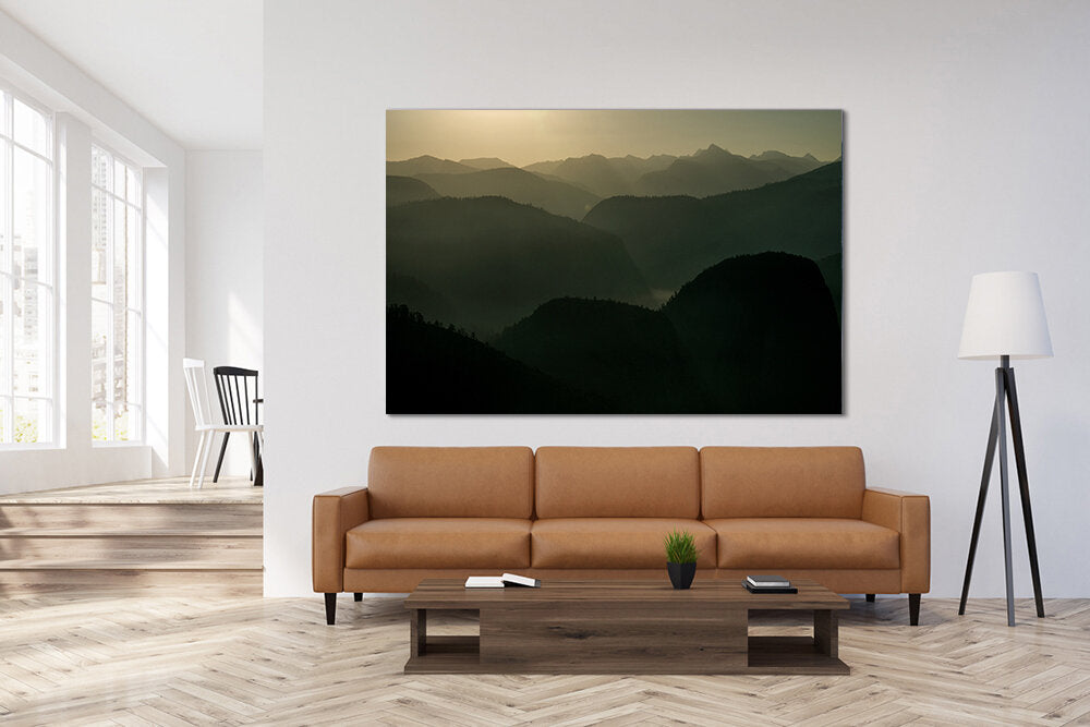 Yosemite Yawns, a fine art print by Mark McInnis hung over a couch.