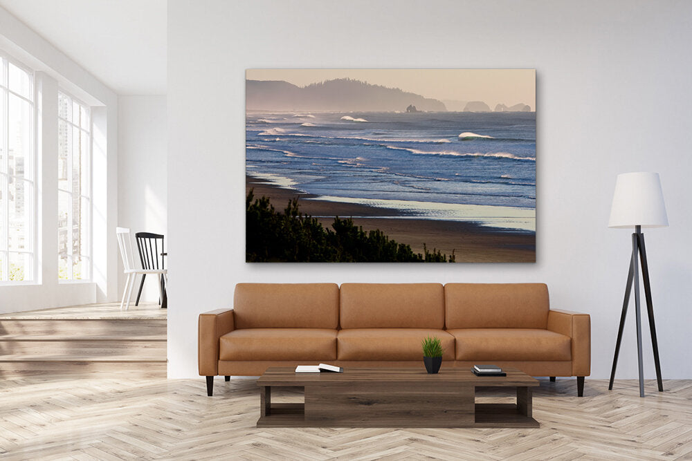 The People's Coast- A photograph by Mark McInnis above a brown couch.