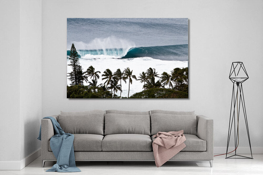 Banzai- A photograph by Mark McInnis above a couch.
