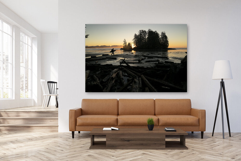 Up and At 'Em, a fine art print photo by Mark McInnis above a couch.