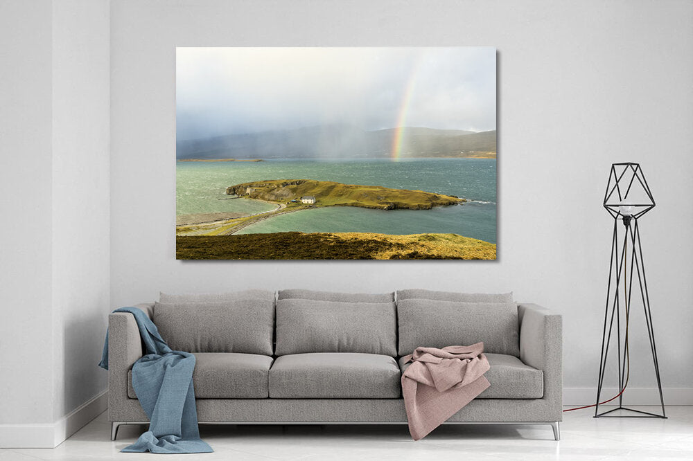 Pot of Gold- A photograph by Mark McInnis above a couch.