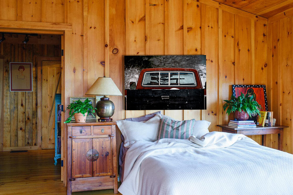 The Alaskan Way- A photograph by Mark McInnis above a bed. 