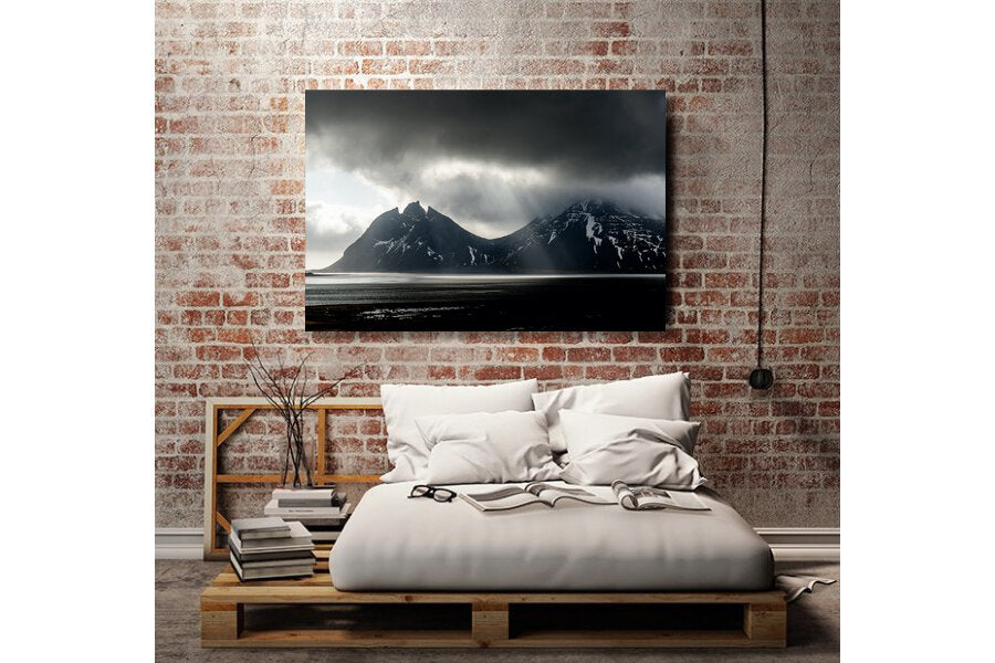 Broken- A photograph by Mark McInnis above a bed.