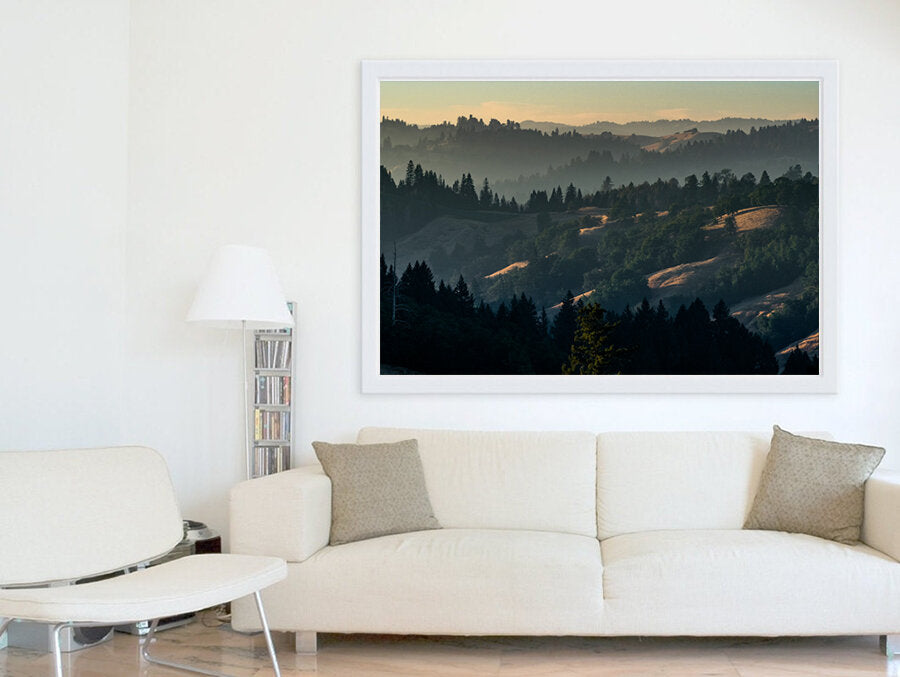 Humbly Humboldt- A photograph by Mark McInnis above a white couch.