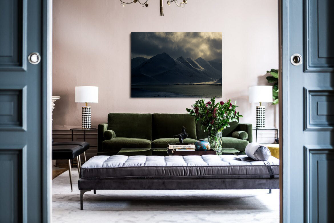 The Icelandic Draw- A photograph by Mark McInnis above a green couch.